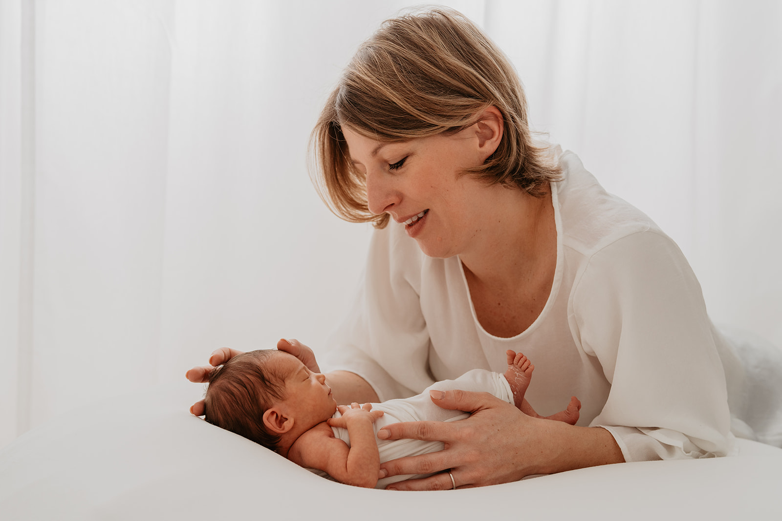Mama mit ihrem Neugeborenen